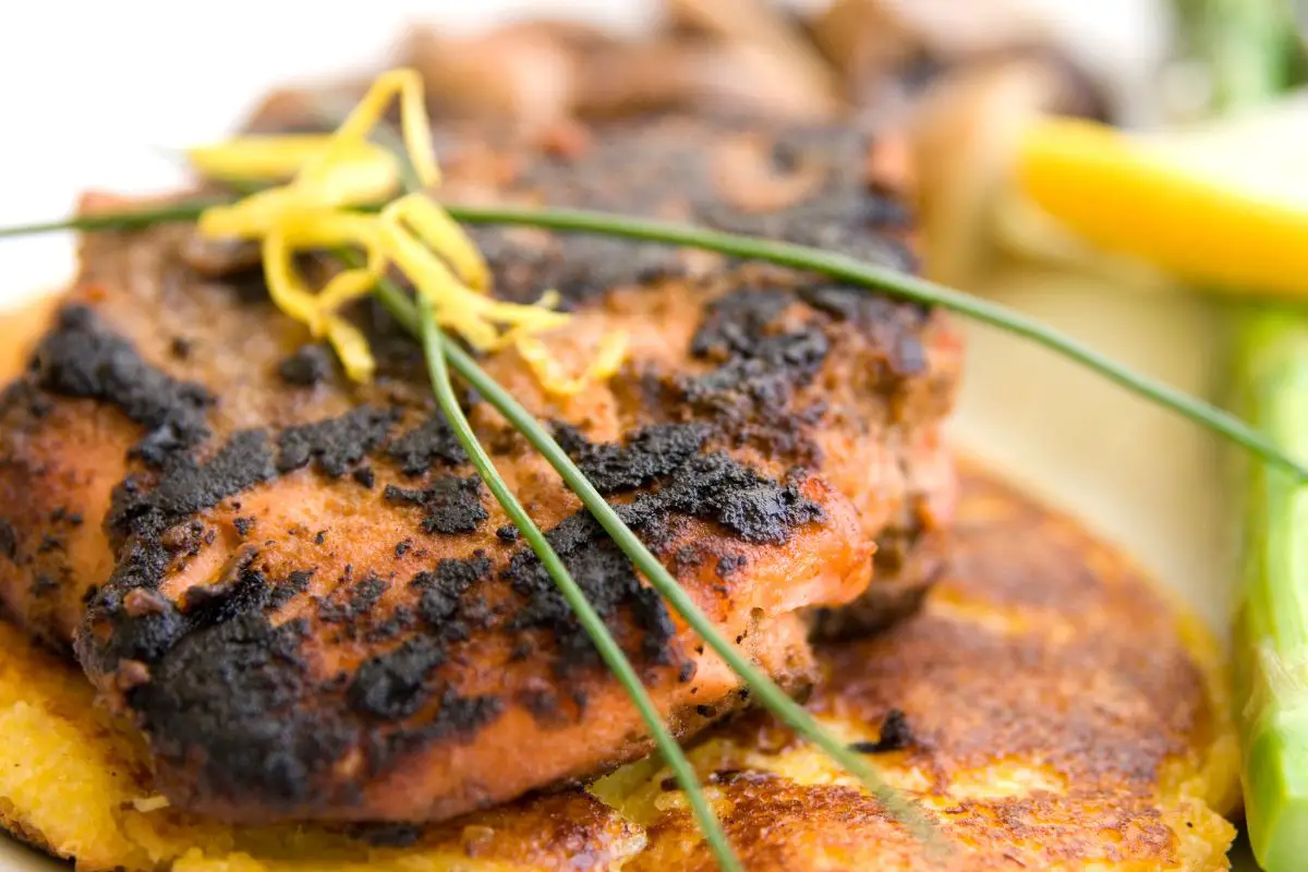 Healthy One Skillet Blackened Salmon Over Cajun Zoodles